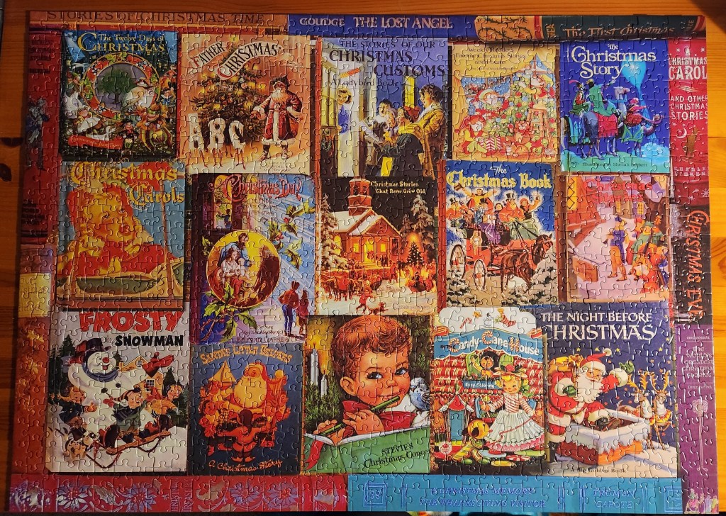 Jigsaw puzzle showing a collage of old Christmas book covers