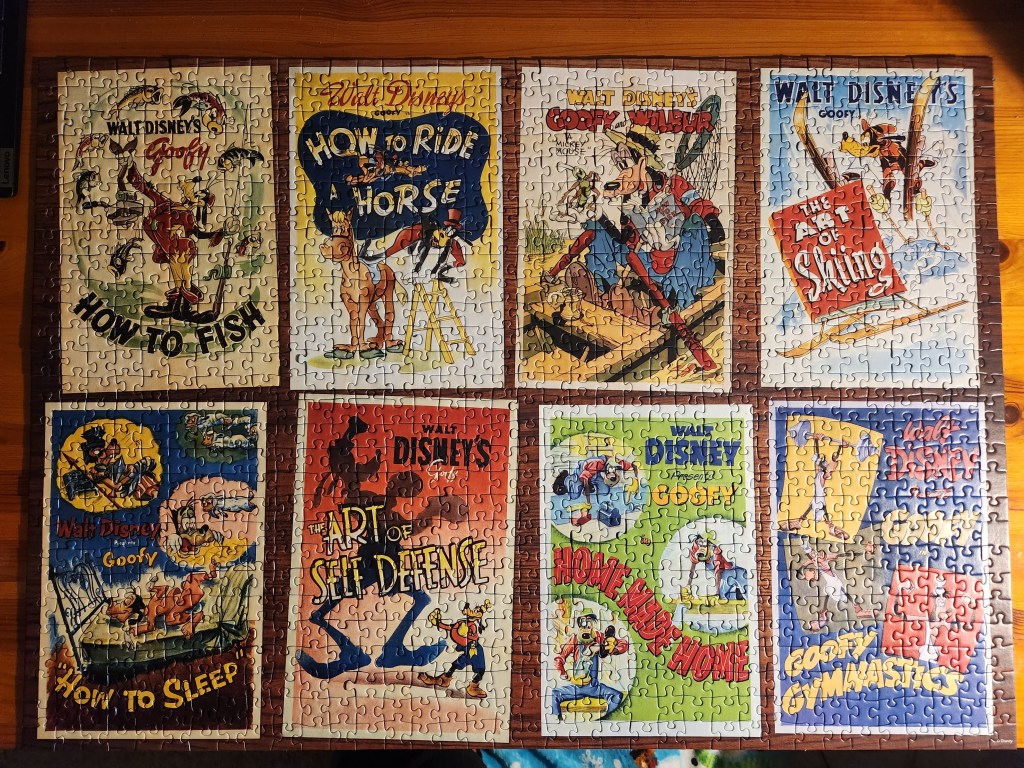 Completed puzzle showing posters for 8 of Disney's how-to cartoons featuring Goofy